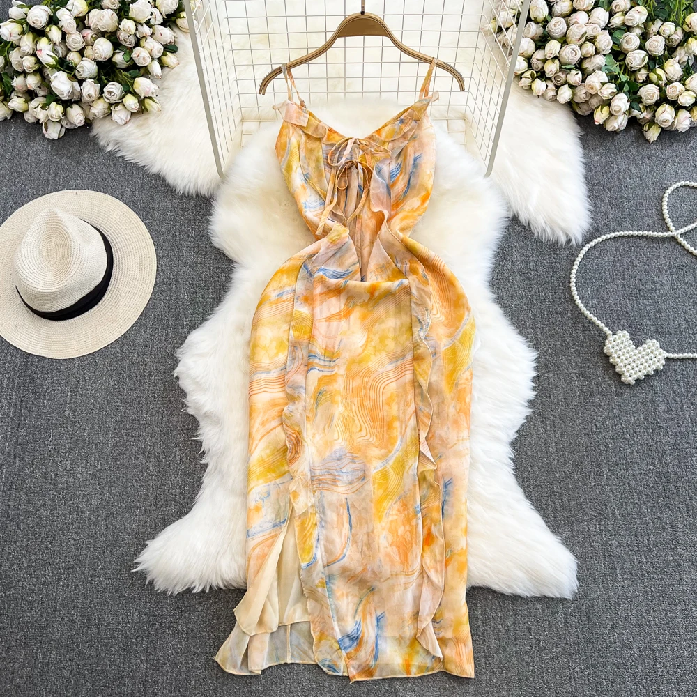 

Clothland Women Sweet Yellow Floral Strap Dress Lace Up Ruffles Sleeveless Backless Beach Wear Chic Midi Dresses Mujer QC579