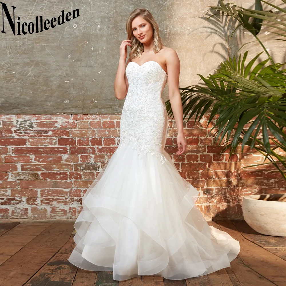 

Nicolle Modern Trumpet Wedding Dresses For Bride Sleeveless Appliques Ruffles Lace Up Backless Court Train Tulle Customised