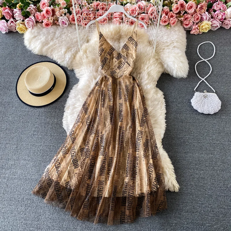 

Vintage Slimming Dress with Large Monogrammed Mesh Halter