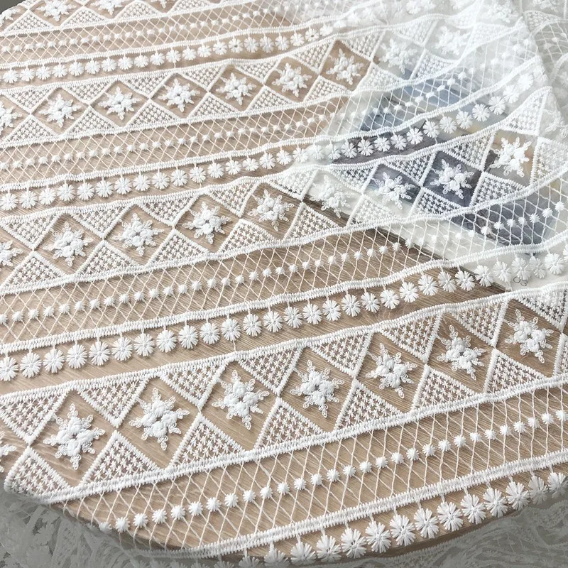 

One meter high quality gauze tissu White plant flower embroidery fabric Handmade dress skirt wedding dress cloth tissus