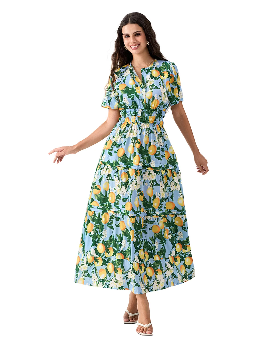 Женское длинное платье с заклепками на подоле V-образным вырезом и коротким