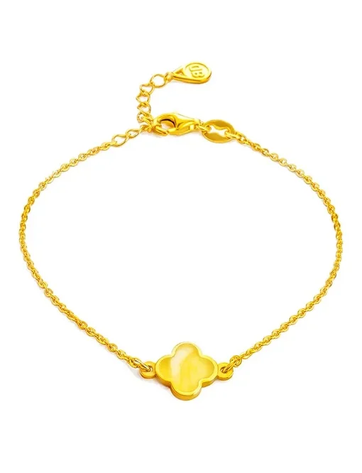 Тонкий изящный браслет из позолоченного серебра и медового янтаря Монако.