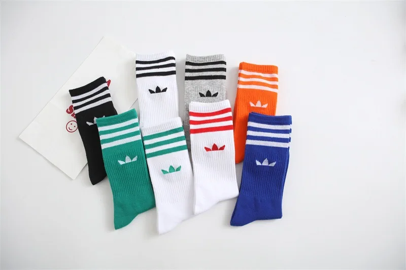 New fashion executive sports socks advertising clover men's and women's cotton socks 2023Ins tide socks striped socks