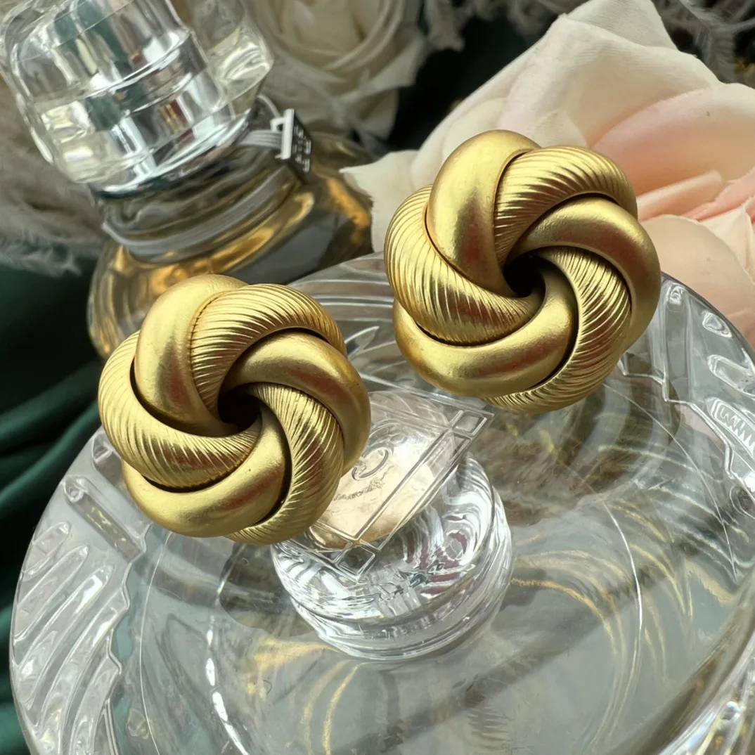 

Medieval vintage flower ball earrings