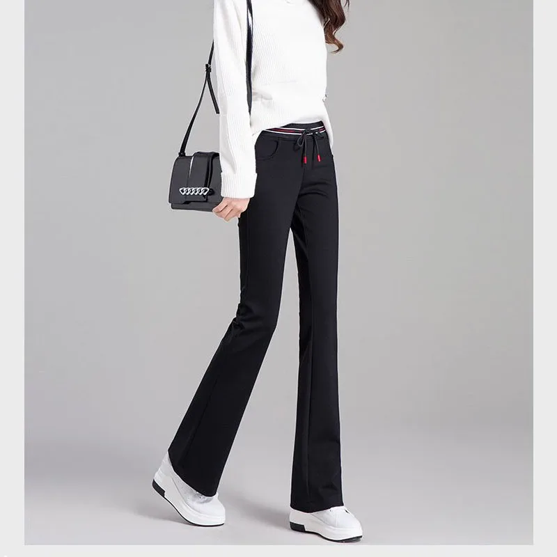 

Брюки-клеш черные с высокой талией и карманами