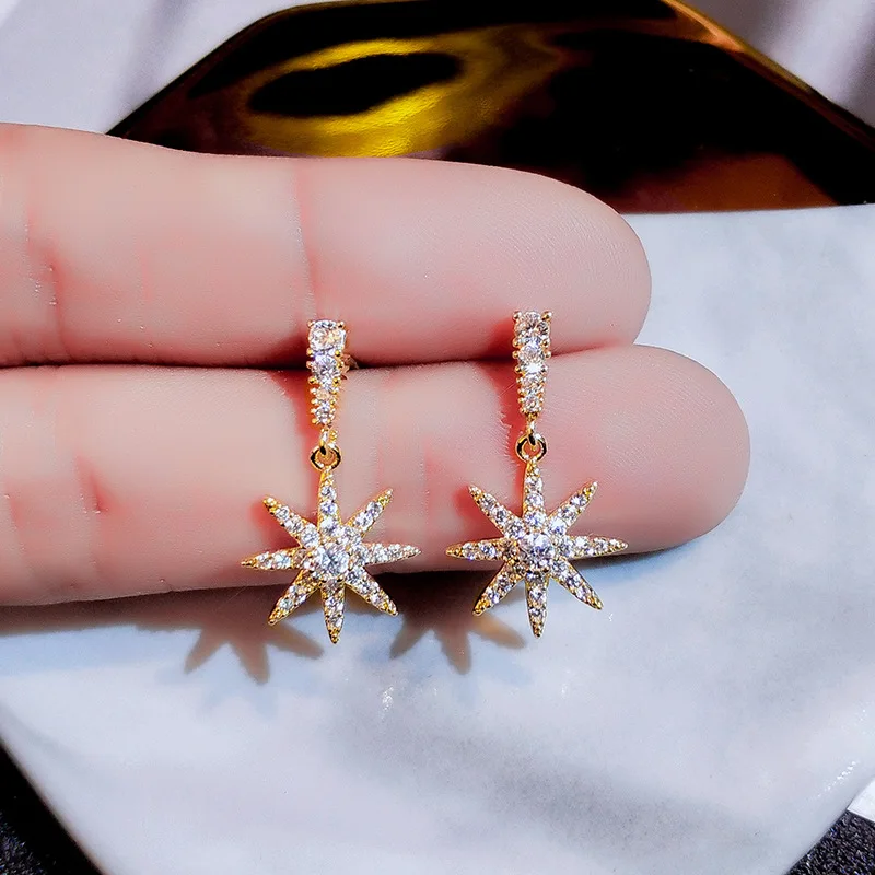 

Dainty Starburst Hook Earrings Silver Dangling Star with CZ Crystals Gold Color North