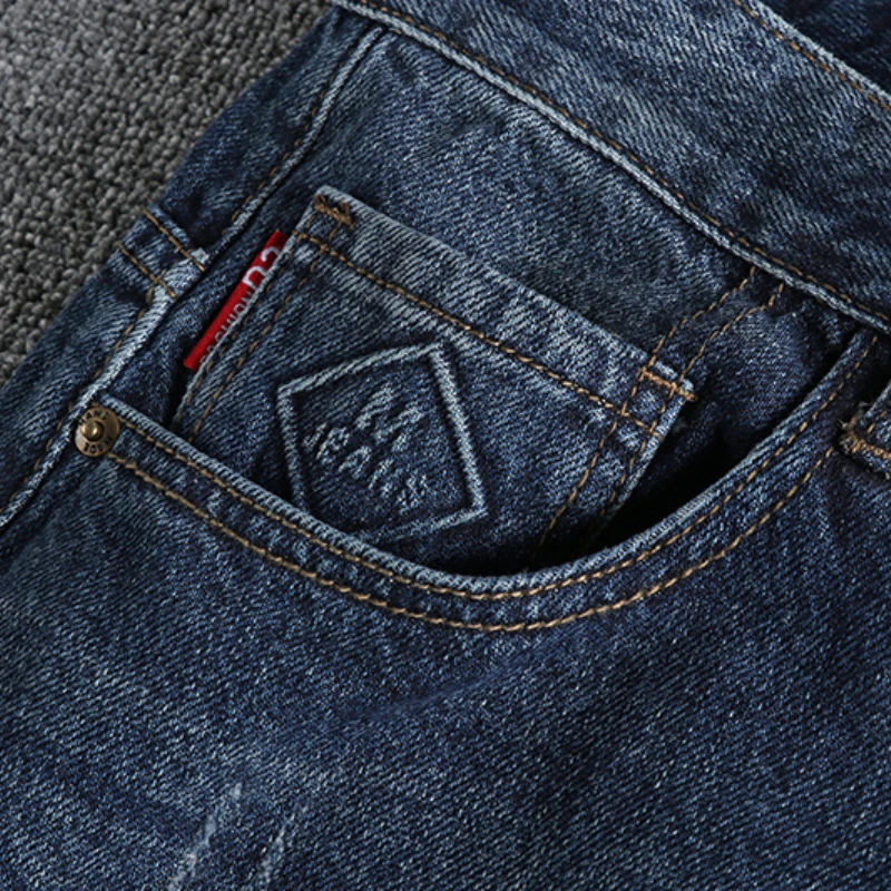 Impressed pattern heavy retro trend high street jeans men have to make old holes patch young daddy pants.