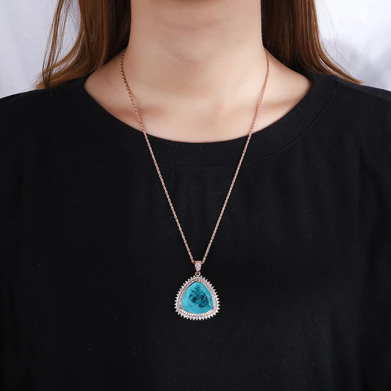 

New fashion trend S925 silver inlaid 5A zircon ladies temperament Paraiba large pendant triangle main stone