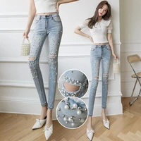 2022 spring and summer new high waist jeans women heavy industry nail bead hole tight slim joker feet pencil pants
