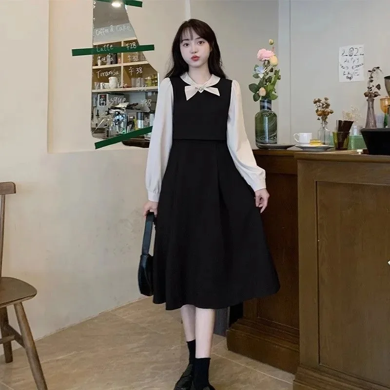 

Контрастное платье-рубашка с бантом и высокой талией