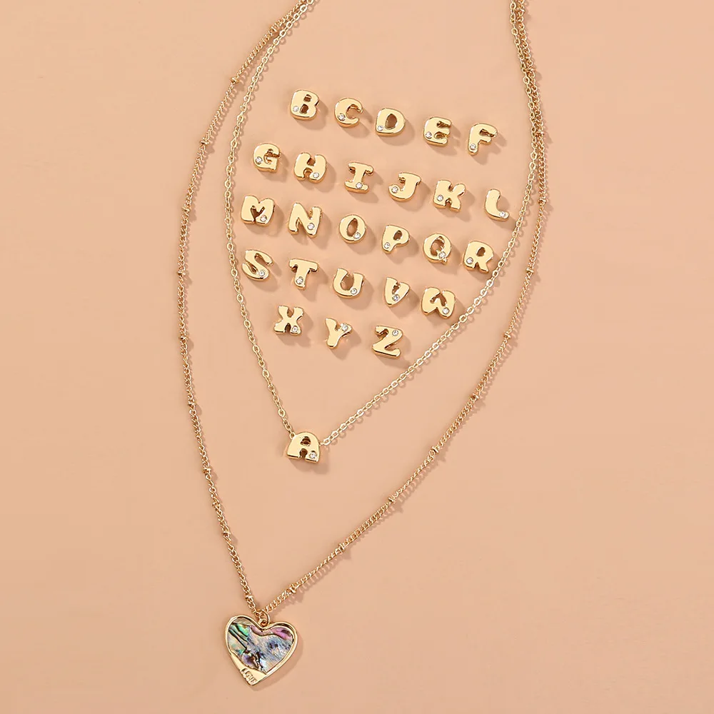 

Оптовая продажа, модное украшение ручной работы, набор из 26 букв, кулон в виде морской ракушки, простое ювелирное изделие, многослойное ожер...