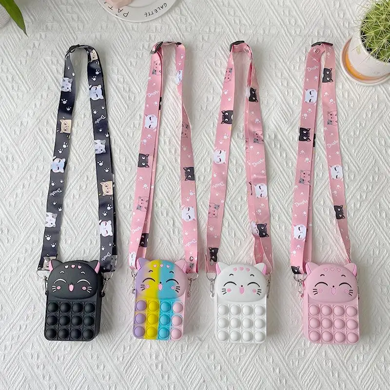 

Новинка, модный кошелек для монет Kitty Pop It Fidget Toys с пузырьками, Радужный Кошелек для монет, женская сумочка из силикона, простая сумка через пл...