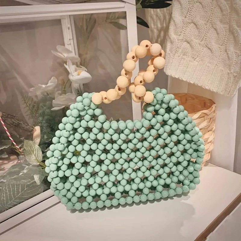 

2023 Summer Rubber Frosted Beads Hand-held Pattern Portable Bag Women's Single Shoulder Hollow Rubber Beading Handbag Clutches