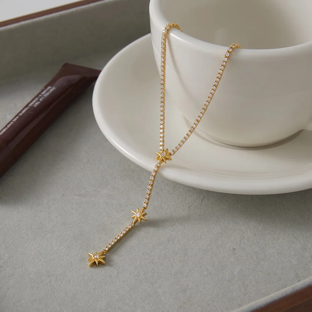 Фото Модное ожерелье-лариат из нержавеющей стали с позолотой 18K и 3 подвесками в виде звезд, водонепроницаемое, гипоаллергенное украшение. №5