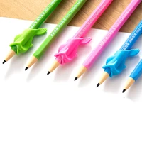 1pcs new creative children pencil holder correction hold pen writing grip posture tool fish hold a pen corrector clip plastic