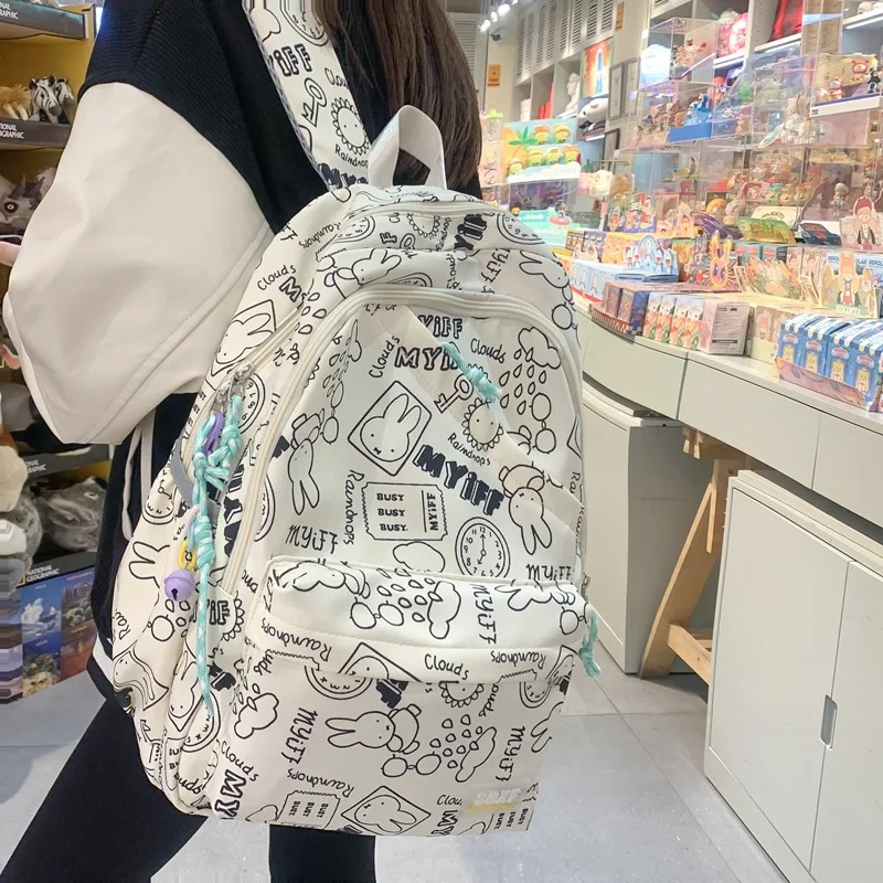 

Backpack for Women 2023 New Cute Graffiti Junior High School Students Schoolbag Casual Canvas Backpacks Mochilas Para Mujer