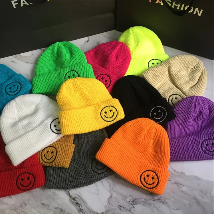

Candy color Korean hats online celebrity Knitted hat women's autumn and winter embroidered knitted smiley face melon skin hats