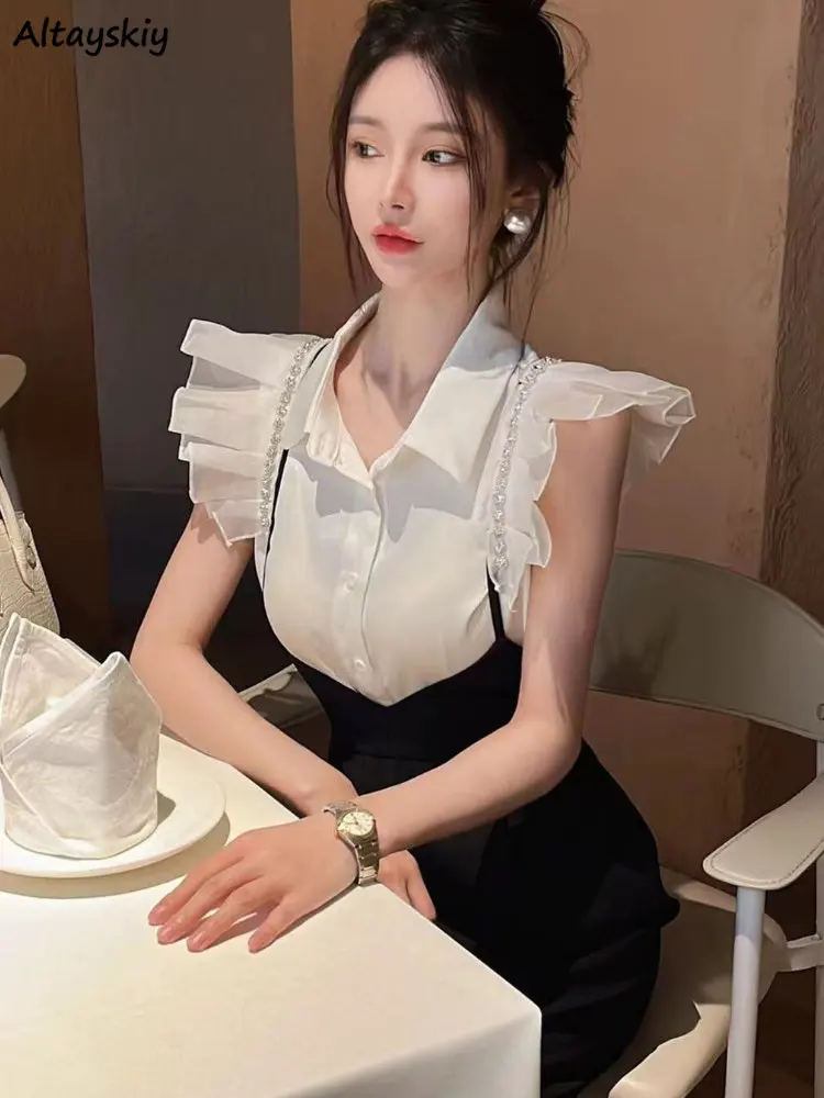 

Женская летняя рубашка с рукавами-фонариками и бусинами