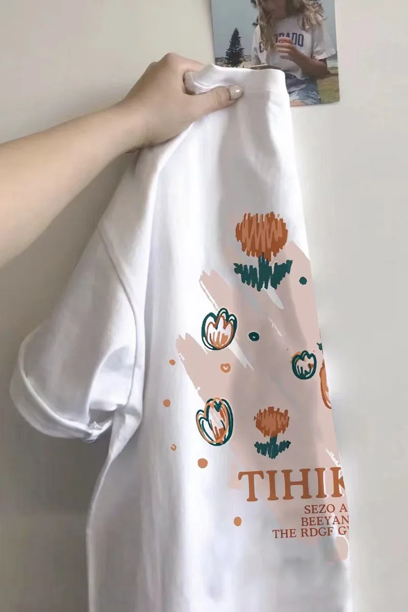 

Женская футболка с коротким рукавом, круглым вырезом и принтом