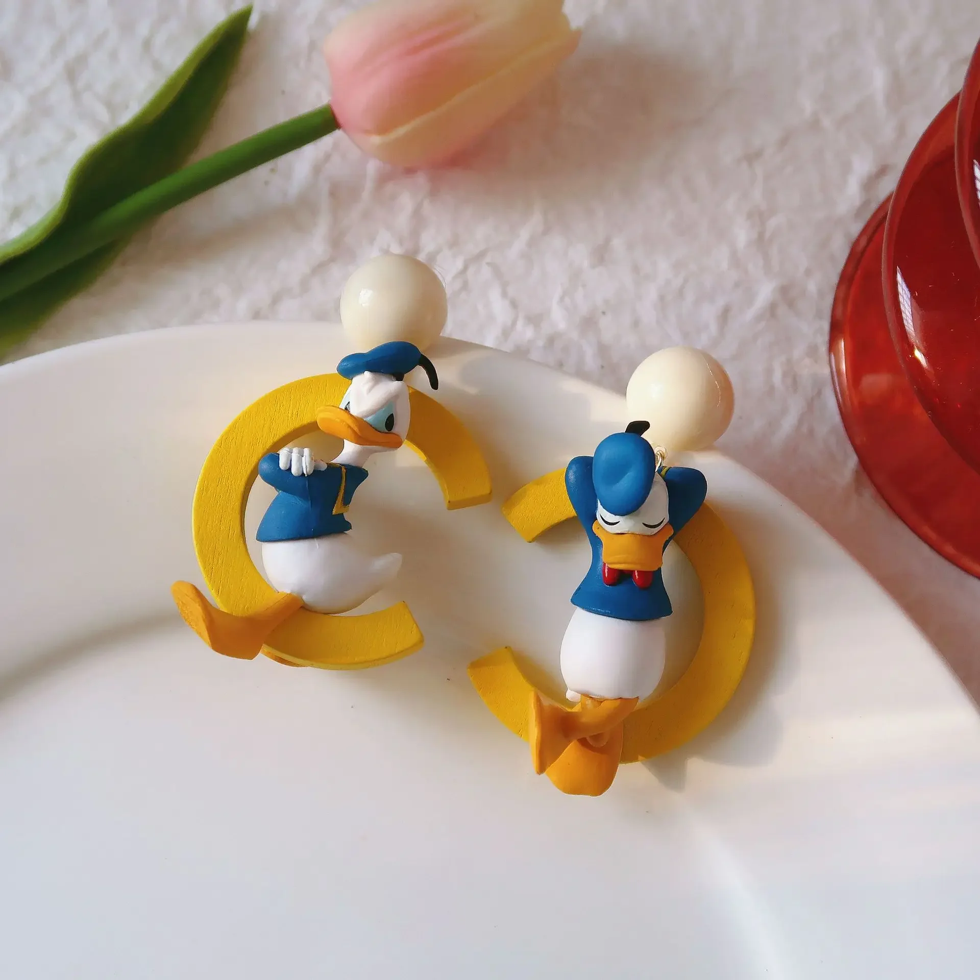 Серьги-гвоздики MINISO с Дональдом Даком