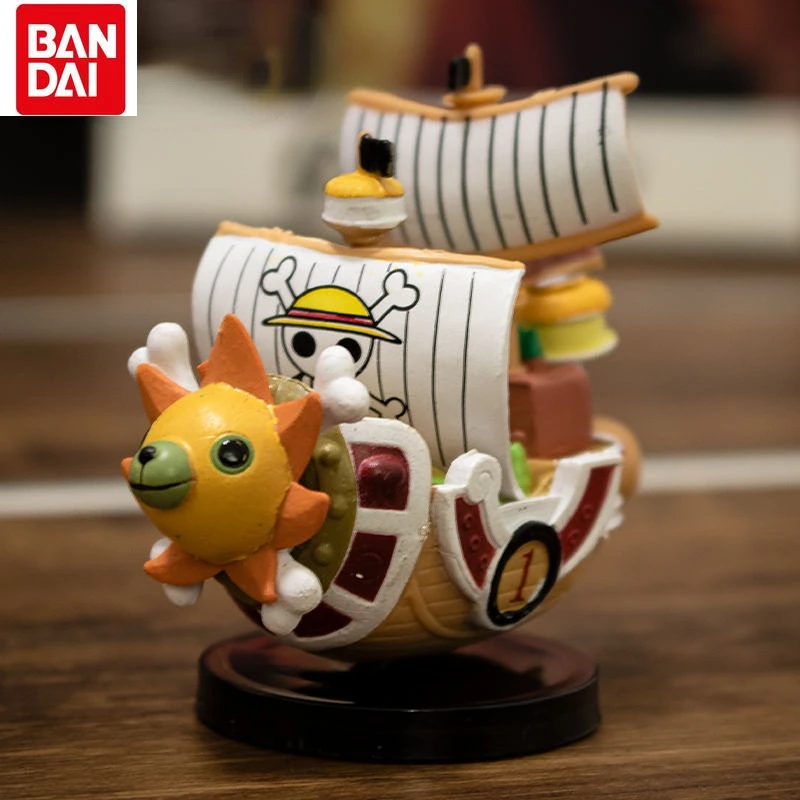 

Bandai One Piece Figure Anime Peripheral Model Cartoon Image Pirate Rudder Shape Mini Sailing Ship Thousand Sunny Ornament