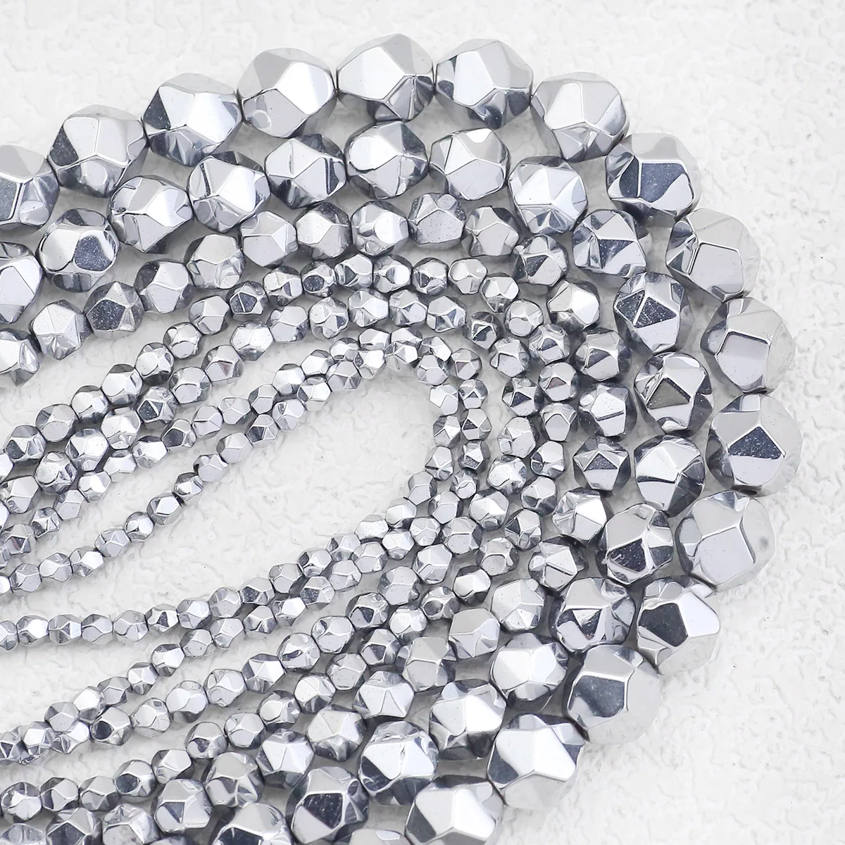 Натуральный гематитовый камень серебристые граненые многоугольные прокладки