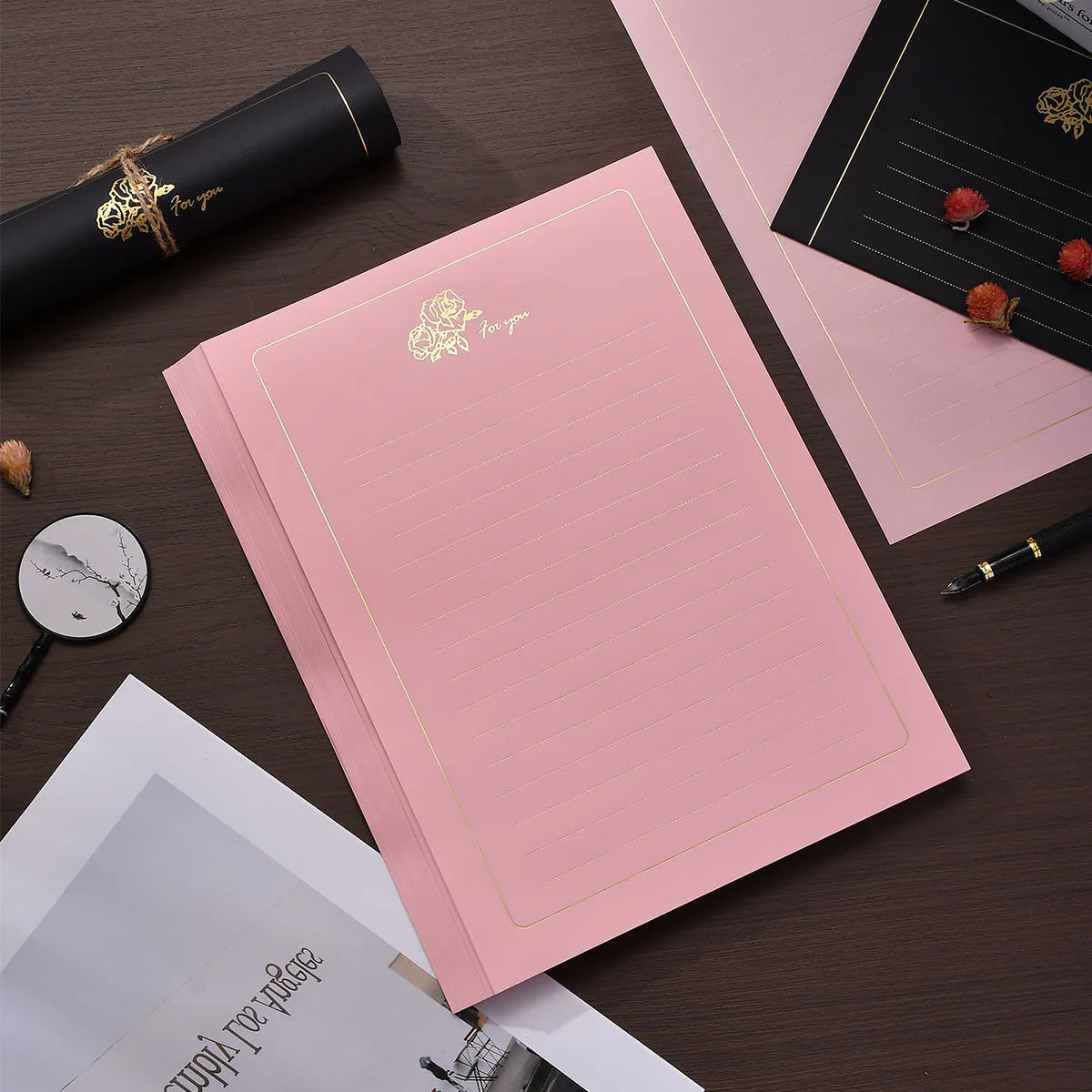 

Розово-белая бумага для писем с золотым тиснением