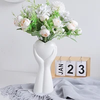 modern tabletop planter pot art ceramic flower vase hand holding plants flower container white vase for home office decoration