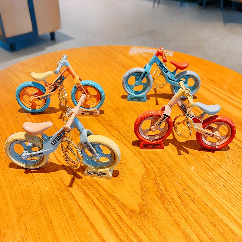 

Creative and Fun To Play Movable and Sliding Bicycles Couple Accessories Keychains Pendants Small Gifts and Ornaments Cartoon