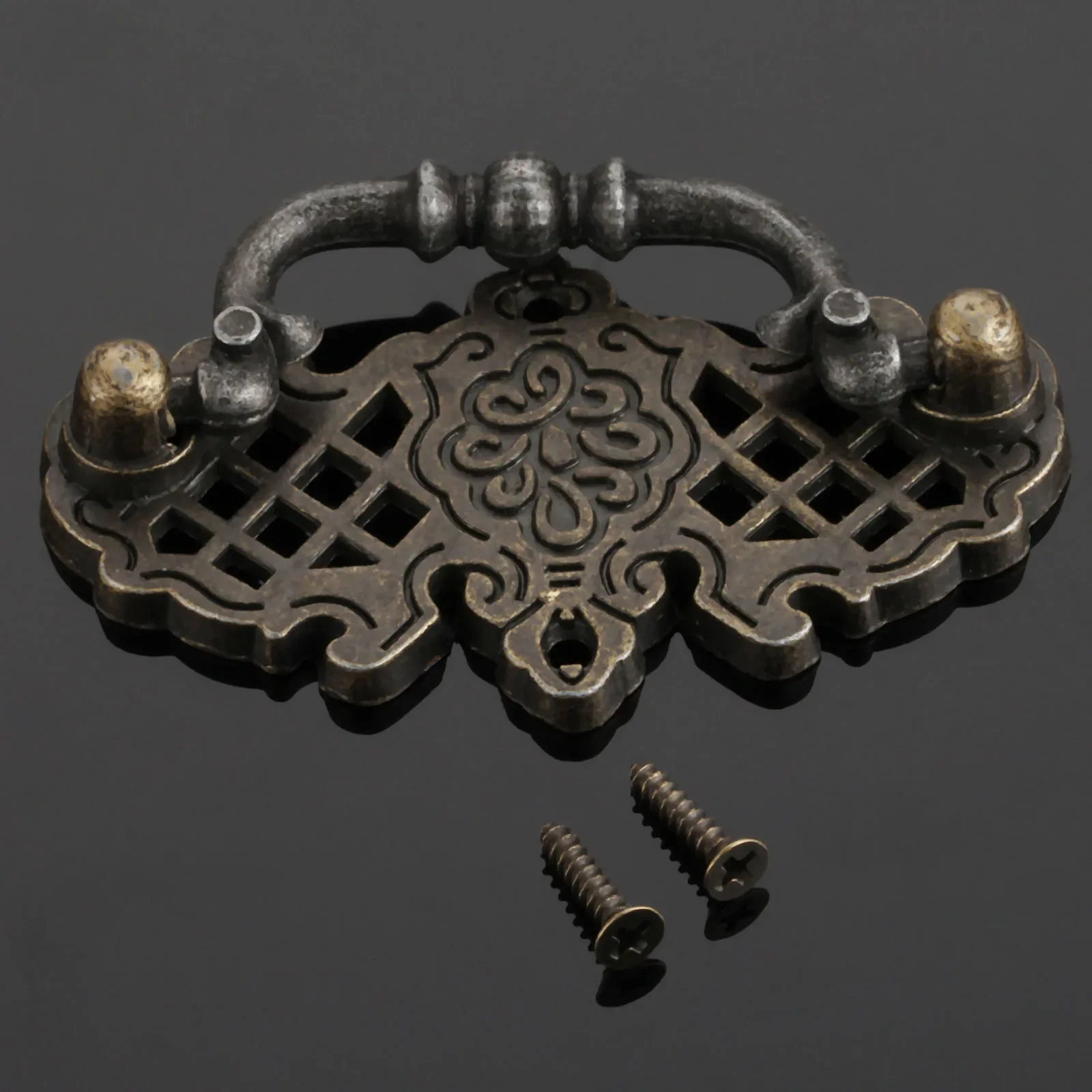 

Ручка для мебели DRELD античная бронза 67*38 мм