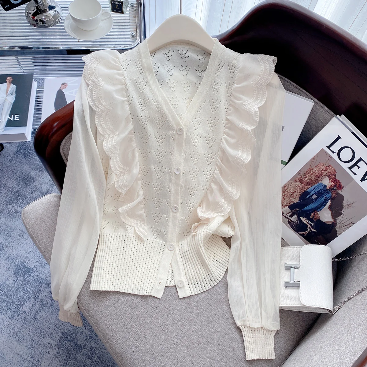 

French ruffle v-neck knitted cardigan women's 2023 spring dress new design sense hollow-out crochet sweater top trend