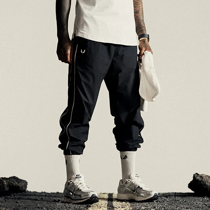 Брюки мужские тонкие повседневные модные брендовые свободные быстросохнущие