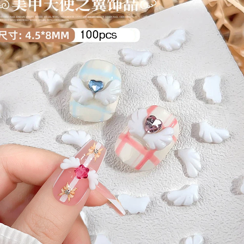 

100Pcs White Angel's Wing Nail Art Decoration 3D Resin Wing Design Nail Charms DIY Acrylic Right+Left Wing Manicure Supplies