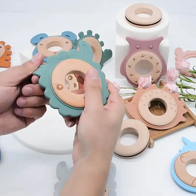 

New Silicone Teether Customized Make Wooden Teether Ring Baby Gift Set Silicone Baby Teether