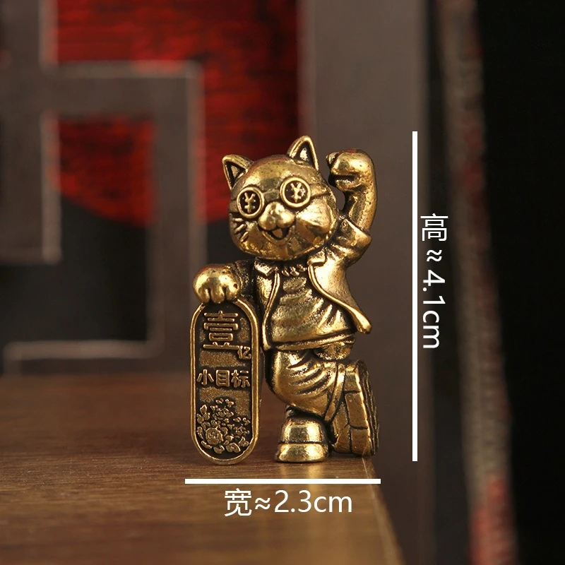 

Металлическая фигурка кошки