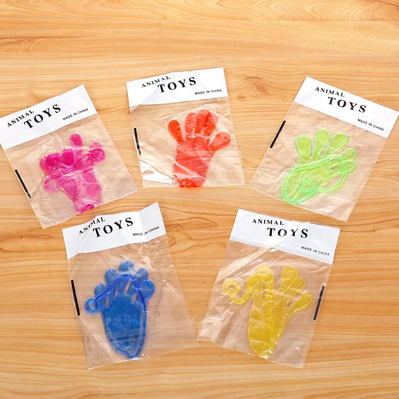

Elastically stretchable sticky palm Climbing Tricky hands toys
