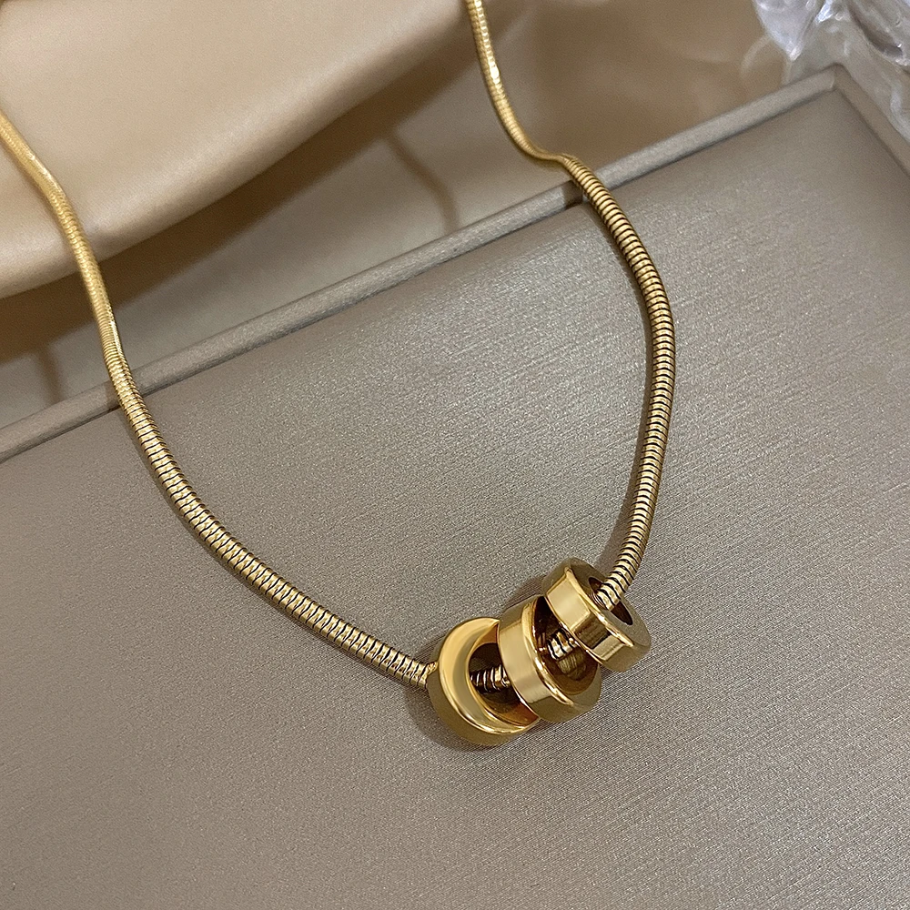 Трендовое позолоченное колье из нержавеющей стали со змеиными костями и кругами