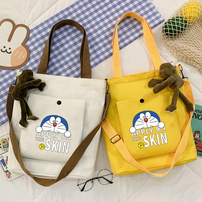 

Cartoon Doraemon Printed Canvas Bag New Small Fresh Student Large Capacity Canvas Bag One Shoulder Women's Bag