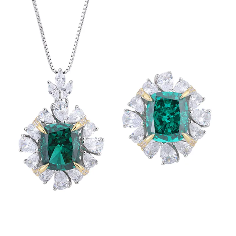 Кольцо и кулон из серебра пробы с высокоуглеродистым бриллиантом изумрудом