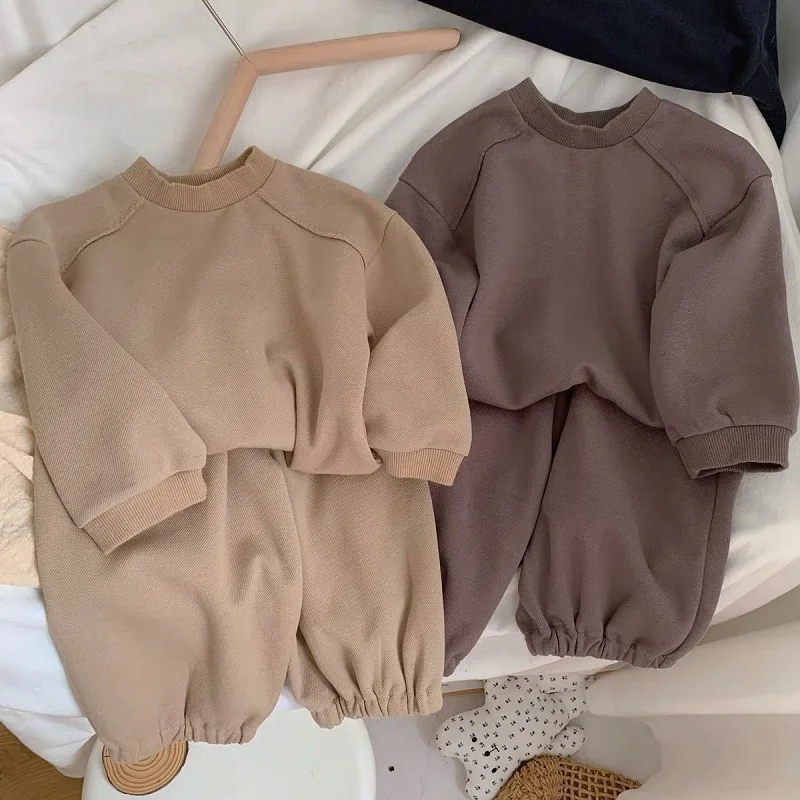 

Autumn new boys and girls simple long-sleeved pullover tops trousers suit baby clothes solid color sports two-piece suit