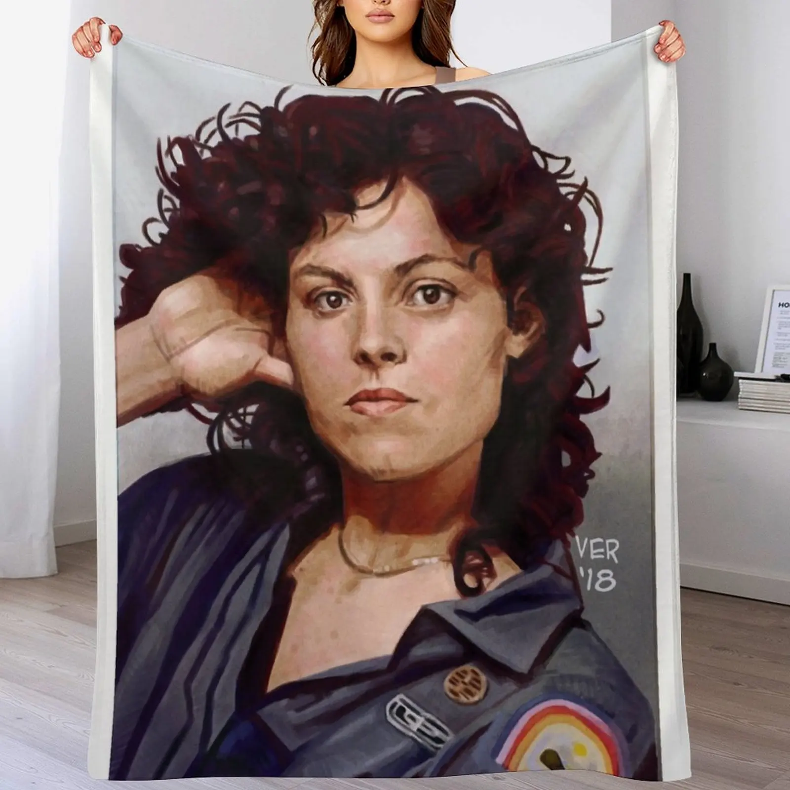 Фото Плед Sigourney Weaver 79: уютное и теплое одеяло для декора спальни №1