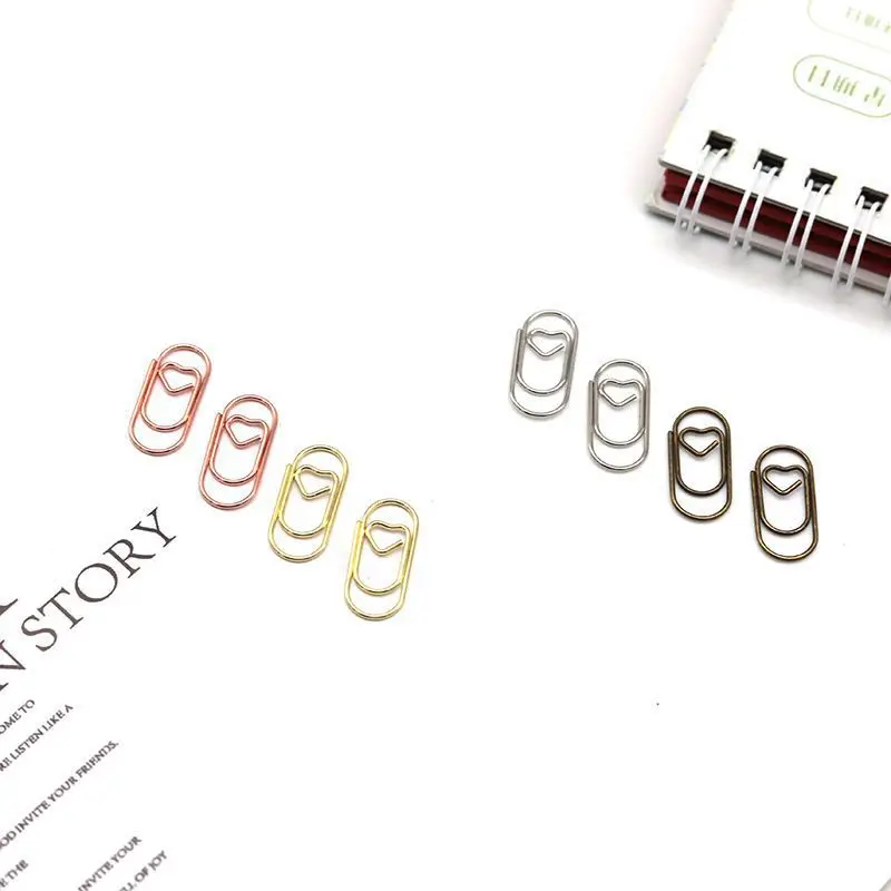 

Золотой мини-зажим для бумаги в форме сердца