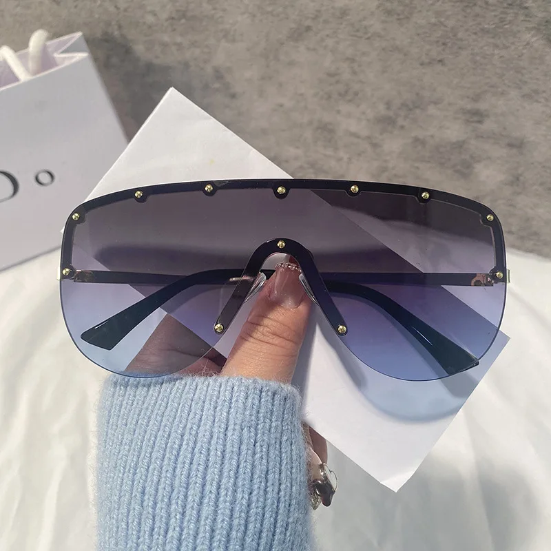 Солнцезащитные очки RNABAU женские с рисовой оправой