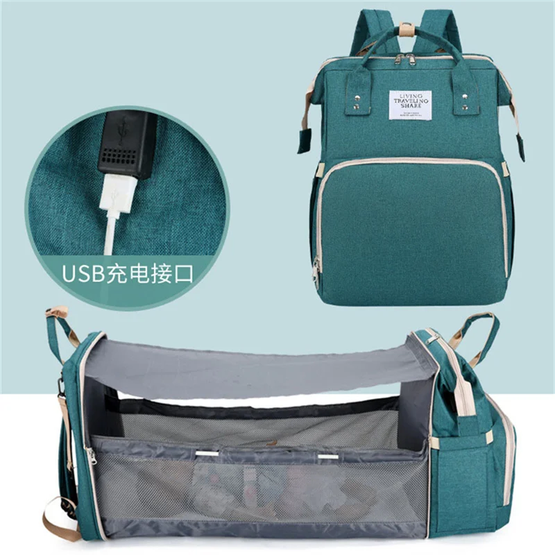 

Foldable Mommy Bag Portable Folding Crib Bed Large-capacity Outdoor Travel Baby Backpack Mommy Diaper Bag with USB and Pad