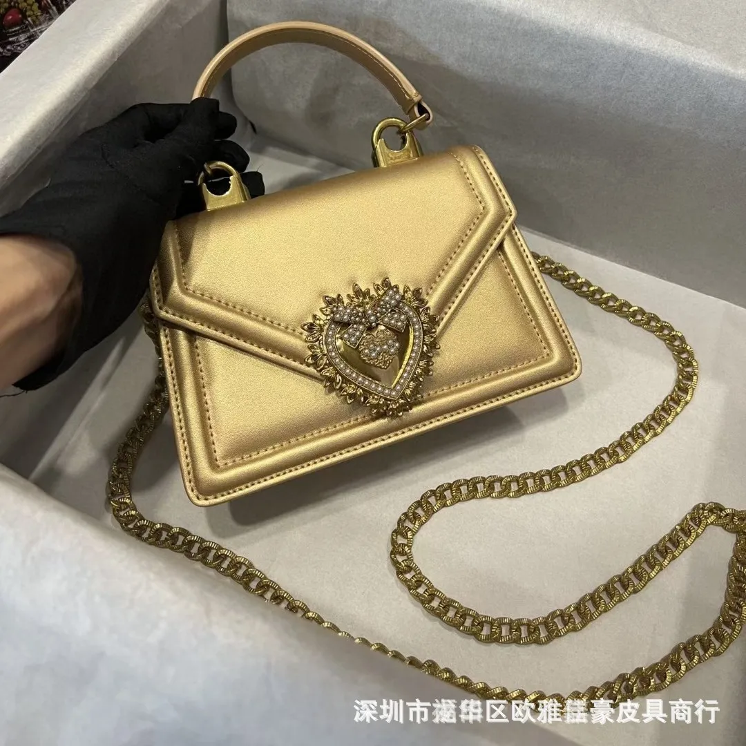 New European and American fashion leather ladies bag senior sense of head layer cowhide slanting chain female bag pearl bag