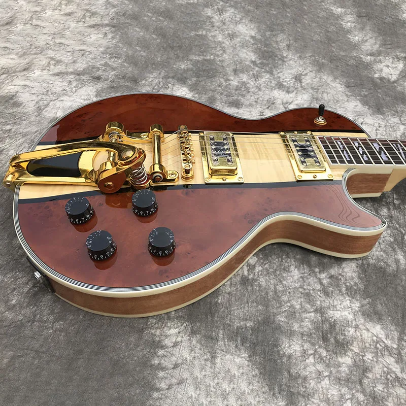 

Китайская электрическая гитара большой SBY Tremolo Золотой Металлические пятна зернистый кленовый коричневый цвет