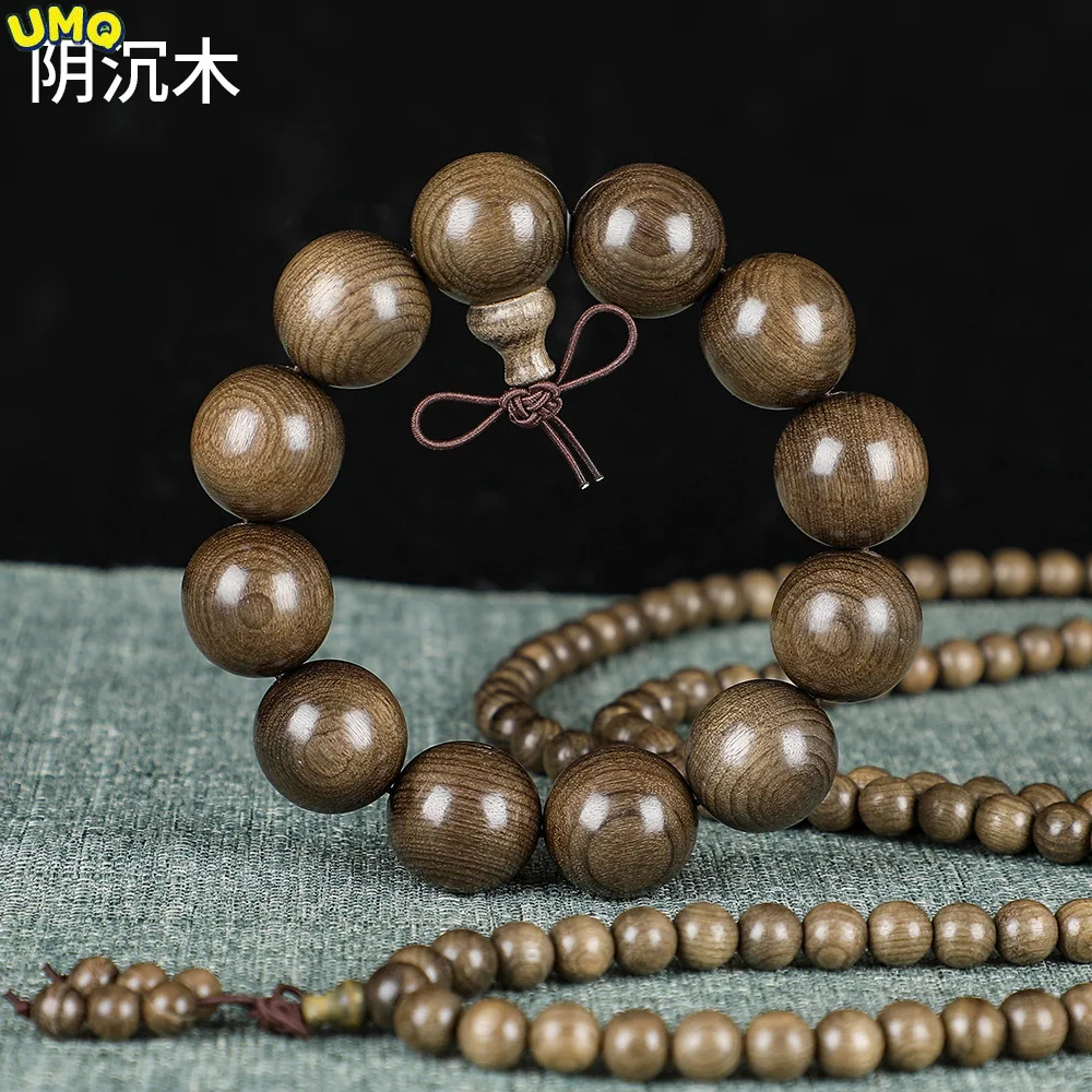 

Sichuan Yinchenmu Hand String Old Material Golden Silk Nanmu Ebony Xiaoshuibo Buddha Bead Wooden Hand String Single Ring