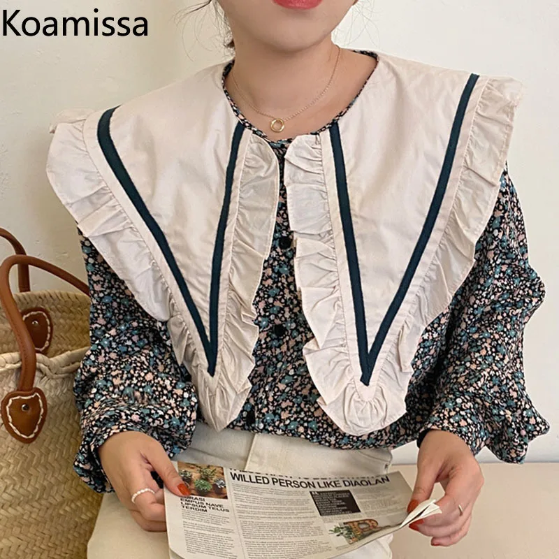 

Женская блузка с воротником «Питер Пэн», длинным рукавом и оборками