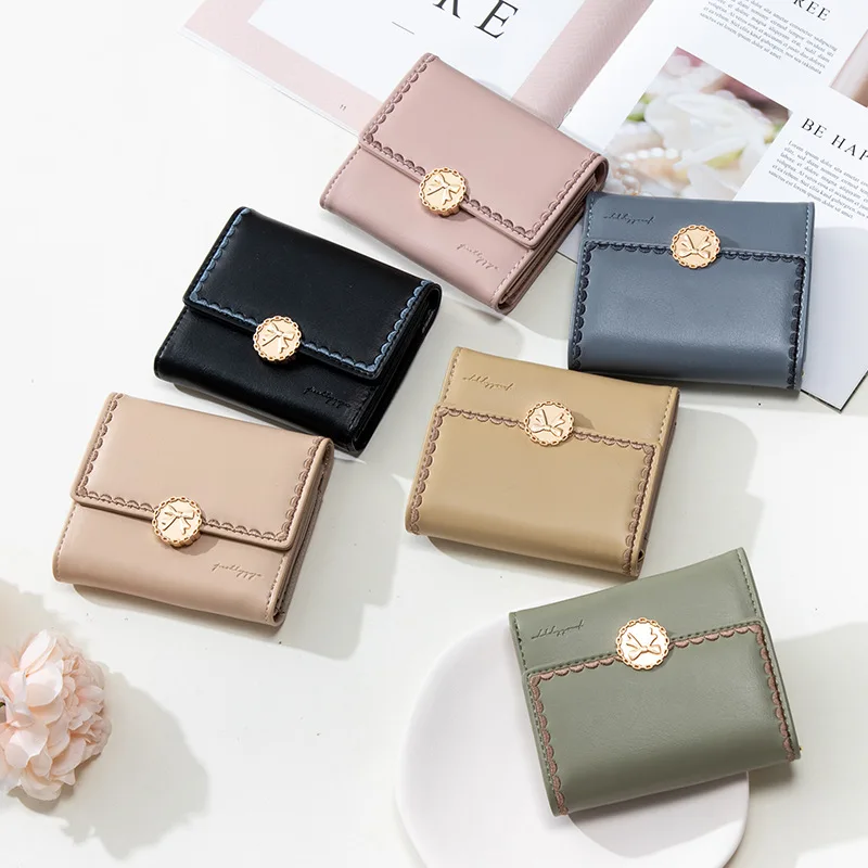 

Autumn New Women's Short Wallet Small Fresh PU Soft Face Simple Buckle Women's 3 Discount Bag
