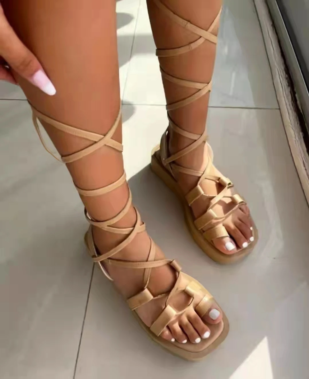 

2022 summer new thick-soled foot ring winding beach sandals women's foreign trade large size medium-heel Roman women's sandals